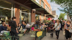 Visitors dine outside in Elmwood Village's busiest bus destination, West Ferry Street.