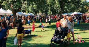 Families stroll around a park in buffalo, another common destination by bus.