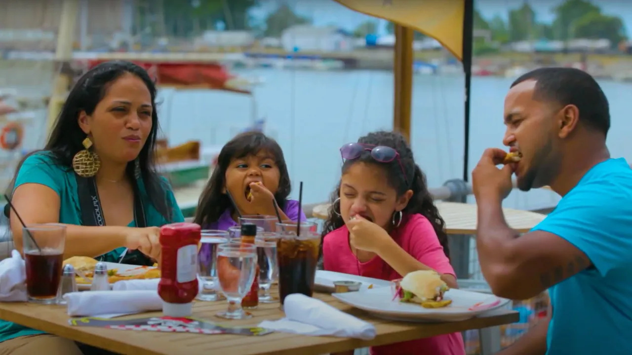 A family eats outside at a restaurant along Buffalo's waterfront