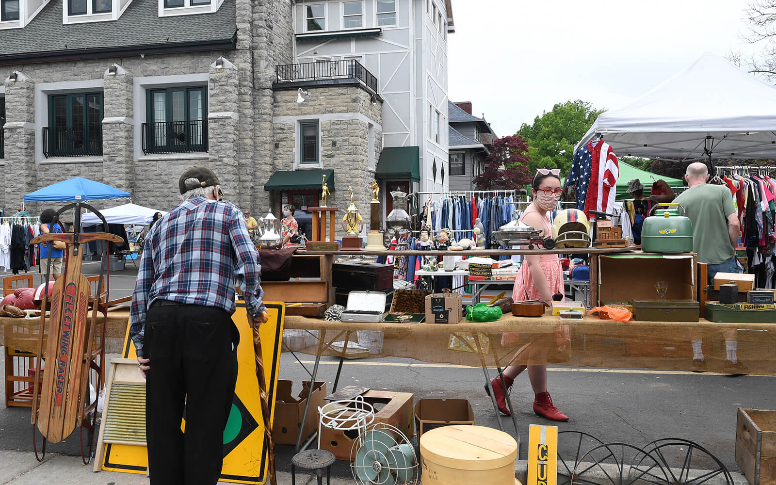 People perusing The Peddler flea and art market in Buffalo, NY